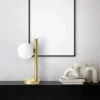 Lámpara de mesa Pomi, 1 luz, color dorado, cristal, altura 28 cm
