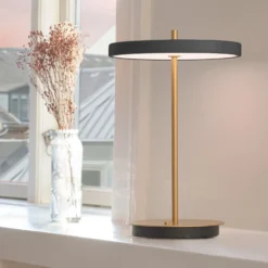 Lámpara de mesa recargable LED UMAGE Asteria Move, color antracita/latón, 31 cm