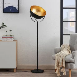 Lámpara de pie Lindby Muriel, 1 luz, negro/oro, metal