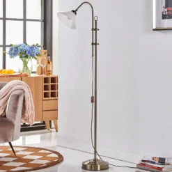 Lámpara de pie Lindby Otis, latón antiguo, cristal, 170 cm, E27