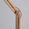Lámpara de pie Lindby Shivanja, madera, regulable, 146 cm, E27