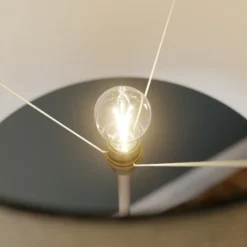 Lámpara de pie Vera con pantalla de tela y decoración de piedra