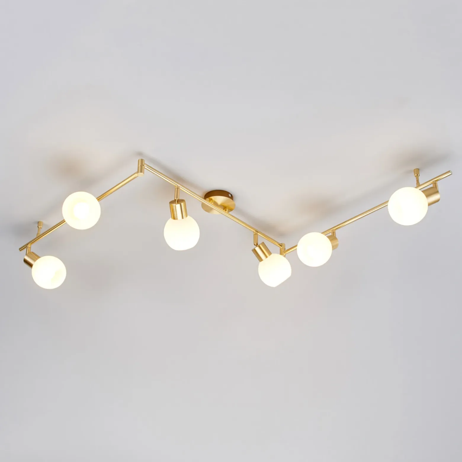 Lámpara de techo Lindby Elaina, 180cm, 6 luces, latón, cristal, E14