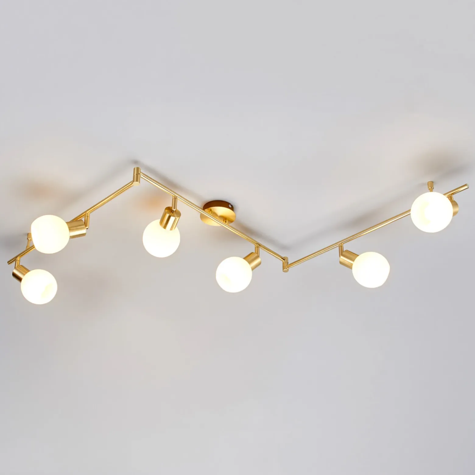 Lámpara de techo Lindby Elaina, 180cm, 6 luces, latón, cristal, E14