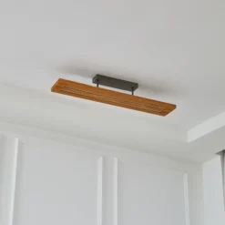 Lámpara de techo Lindby LED Nesaja, negra, madera, 98cm, atenuable