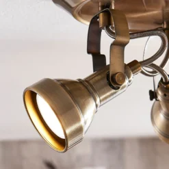 Lámpara de techo Lindby Perseas, Ø 22cm, 3 luces, latón antiguo, GU10