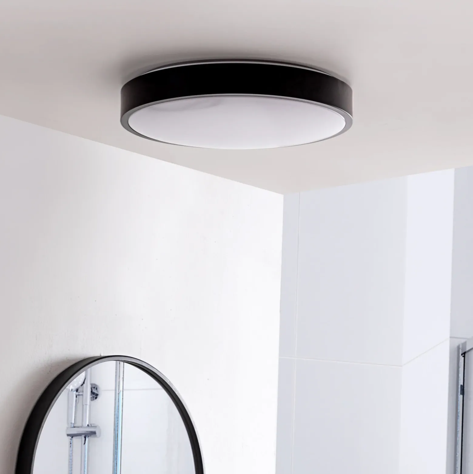 Lámpara LED de techo Lindby Medon, Ø 38 cm, negra, IP44, metal