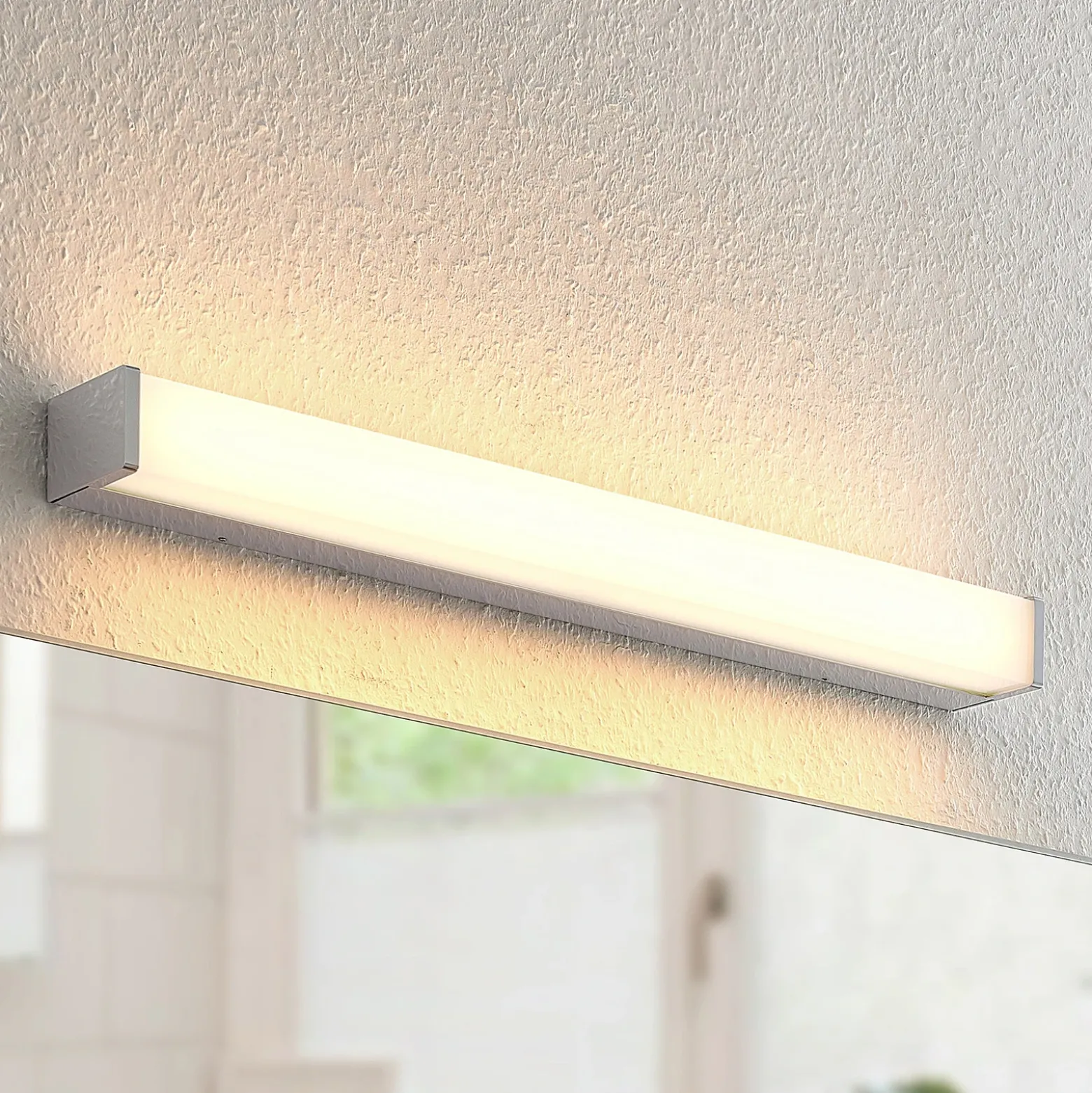 Lámpara LED para cuarto de baño Klea de Lindby, 60 cm, cromo, metal, IP44