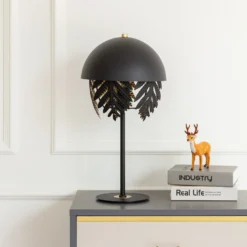 Lucande Aparas lámpara de mesa look hoja, negro-oro