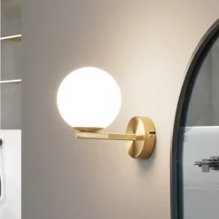 Lucande aplique de pared Bidolo, color latón, cristal, 12 cm, IP44