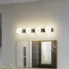 Lucande aplique de pared LED para baño Myrra, negro, cristal, 60 cm, IP44