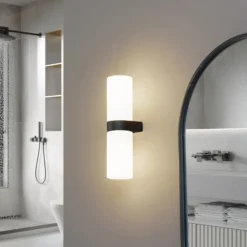 Lucande Basolo aplique para baño, negro, altura 31,5 cm, cristal