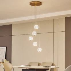 Lucande Lámpara colgante LED Ismenia, 5 luces, latón, acrílico