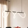 Lucande Lámpara colgante LED Kisune, blanco/negro, metal
