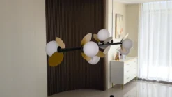 Lucande Lámpara colgante LED Pallo, 7 luces, negro/oro, cristal