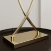 Lucande lámpara de mesa Evaine, latón/negro, 66 cm, E27