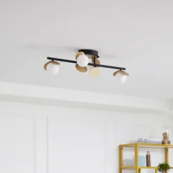 Lucande Lámpara de techo LED Pallo, 4 luces, negro/oro, cristal