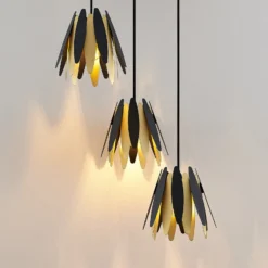 Lucande Lounit colgante, negro-dorado, 3 luces