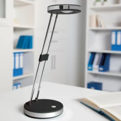 MAULpuck Lámpara de mesa LED, brazo telescópico, negro