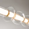 Maytoni Cosmo lámpara colgante LED, latón, longitud 98 cm, cristal