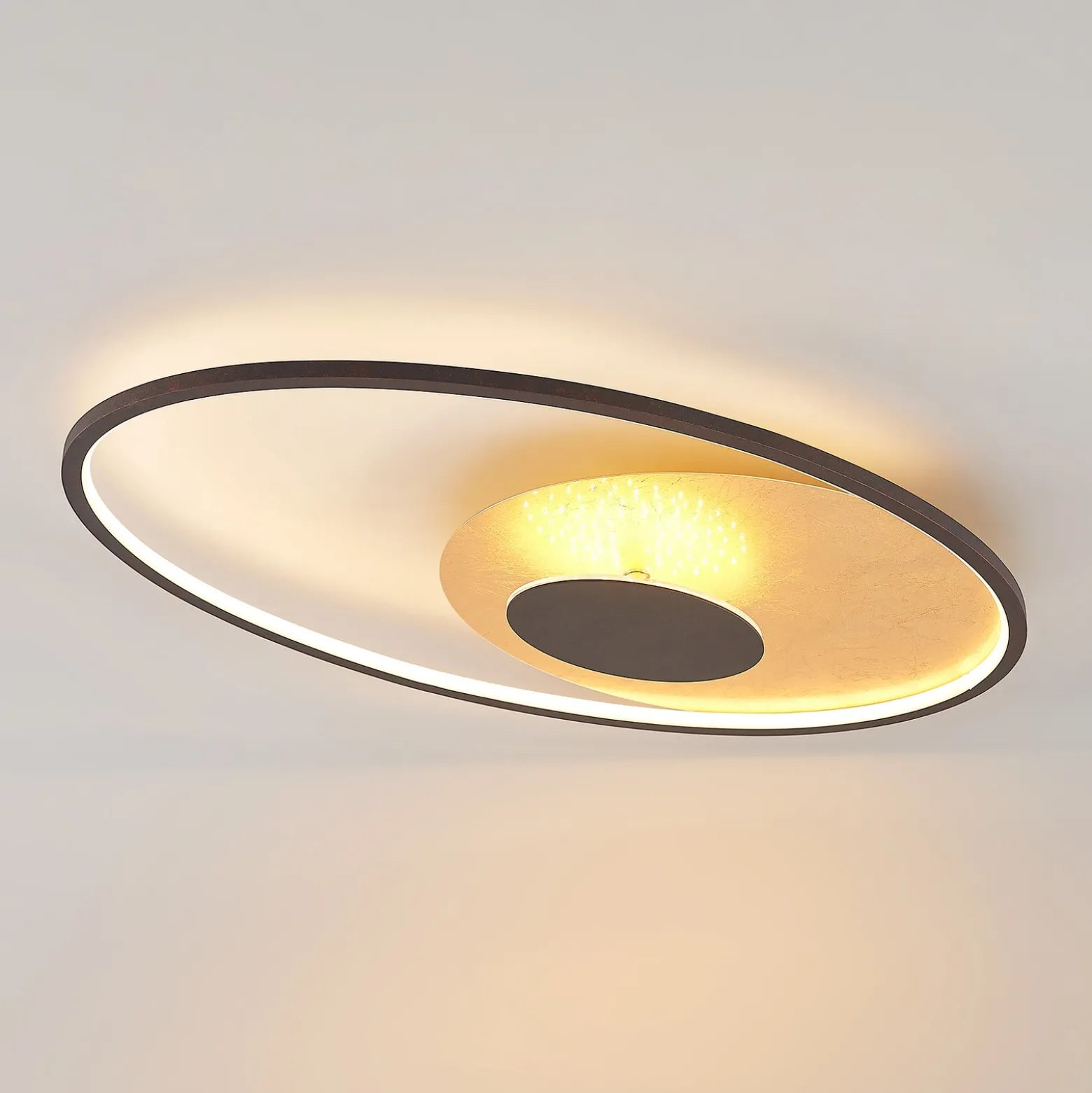 Plafón LED Lindby Feival, 73 cm, óxido/oro, atenuable