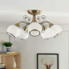 Plafón Lindby Corentin, 5 luces, blanco/latón, cristal
