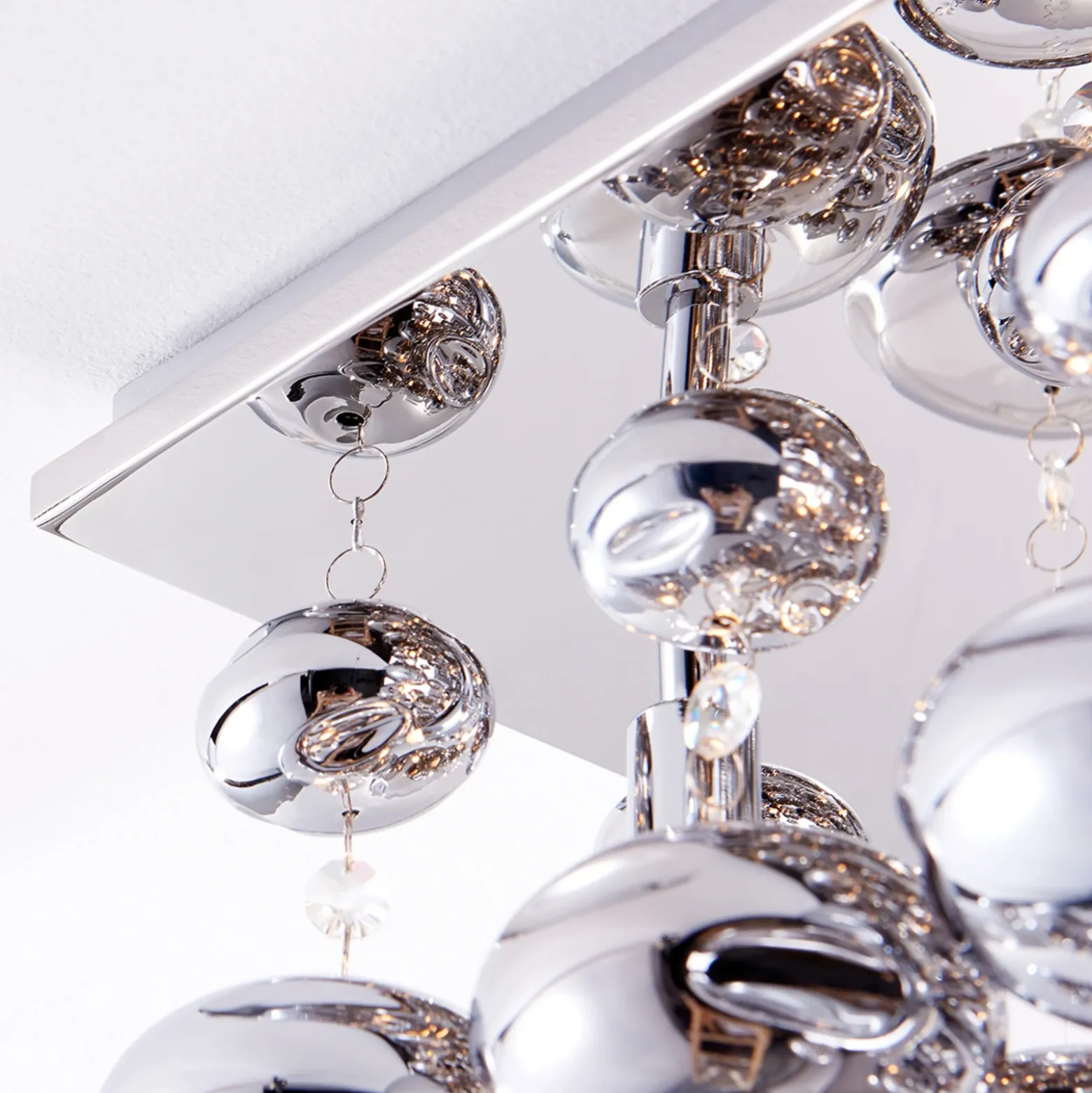 Plafón Lindby Esfera, gris humo, cristal, 4 luces, 35cm
