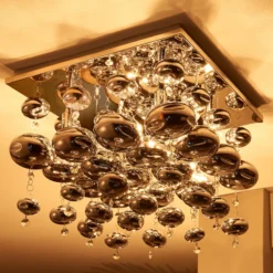 Plafón Lindby Esfera, gris humo, cristal, 4 luces, 35cm