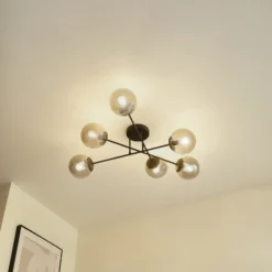 Plafón Lindby Isamer, gris humo, Ø 80 cm, globo