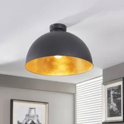Plafón Lindby Lya, Ø 40 cm, negro-oro, metal