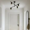 Plafón Lindby Marilou, negro arena, 4 luces, Ø 70cm