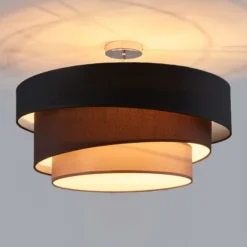 Plafón Lindby Melia, negro/marrón, tejido, Ø 56 cm
