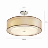 Plafón Lindby Pikka, marrón, de tela, Ø 50 cm, E27