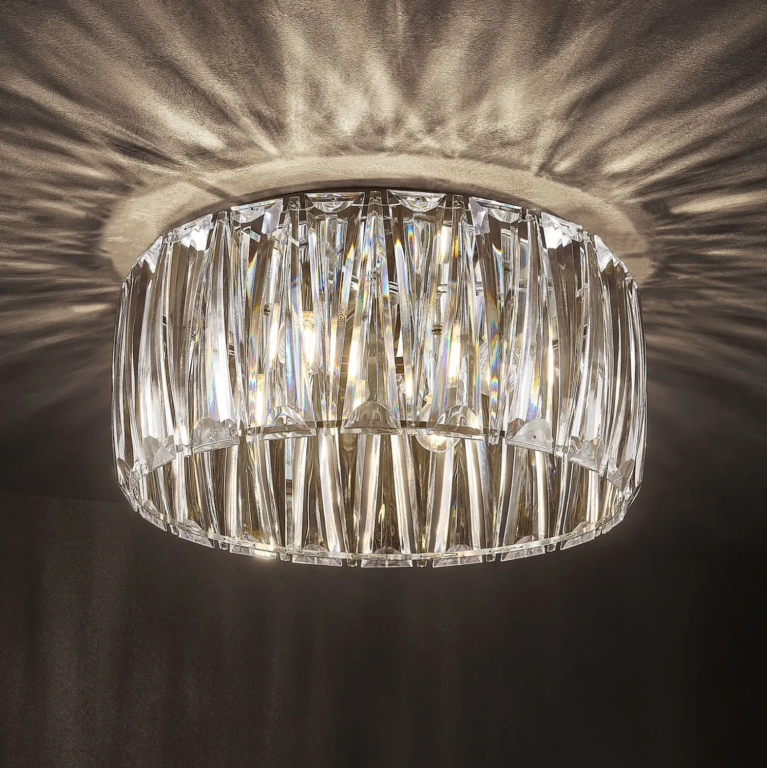 Plafón Lindby Sofia, transparente, acrílico, Ø 46cm