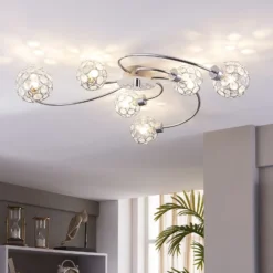 Plafón Lindby Tyron, Ø 65 cm, cromo, cristal, metal