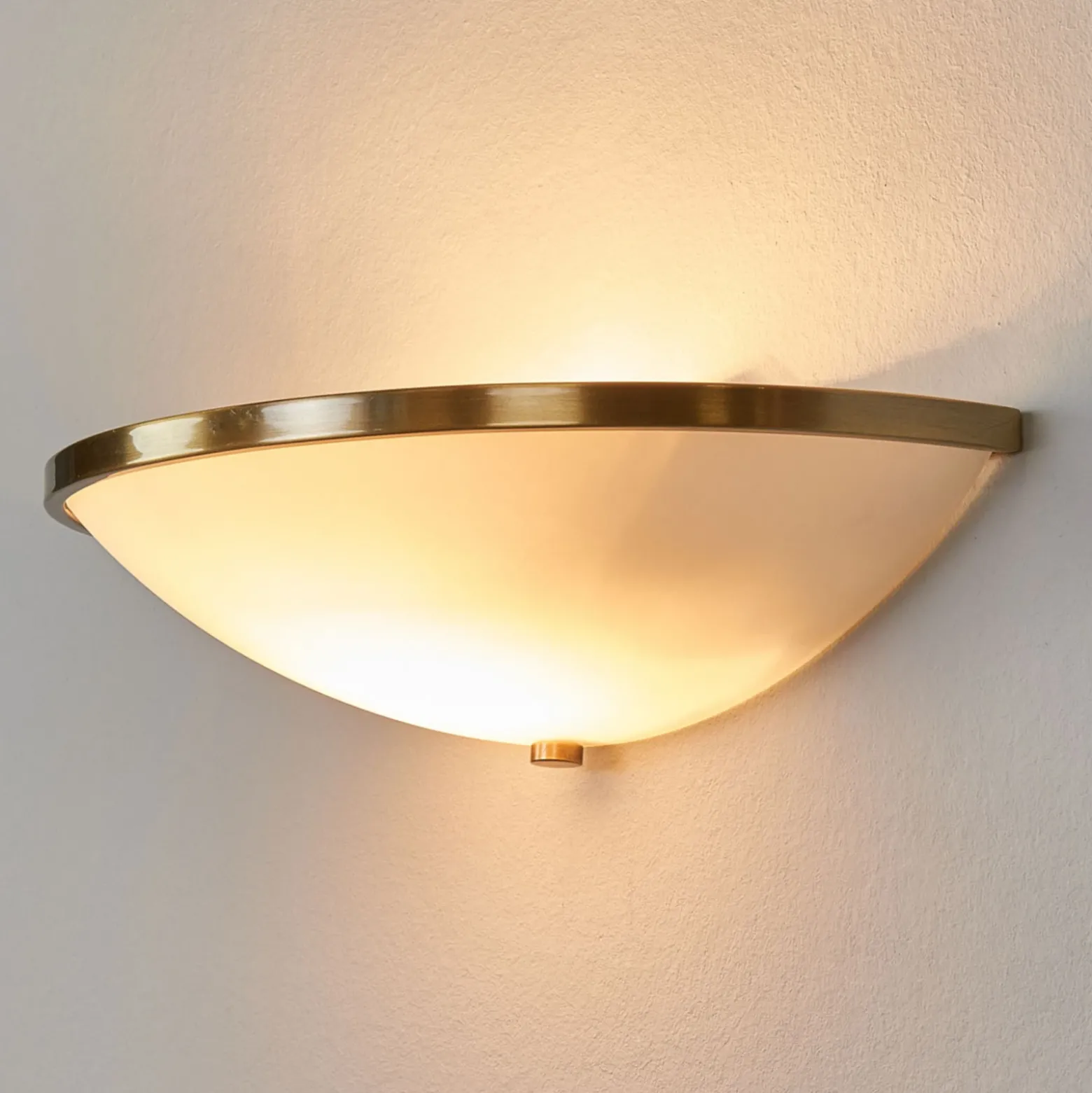 Refinado aplique TALYA en latón envejecido