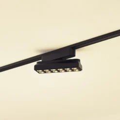 Regleta LED Lindby 48 V Lumaro, negra, 12 puntos, atenuable