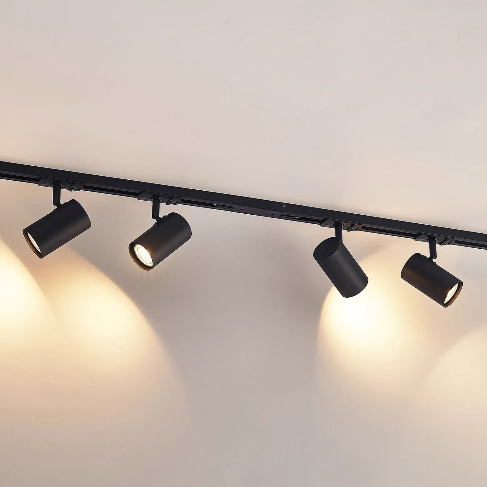 Sistema de riel Lindby Linaro, GU10, 4 luces, negro, Ø 6 cm