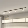 Sistema de riel monofásico Lindby, E14, 4 luces, negro